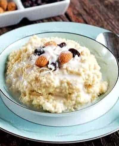 A plate of food on a table, with Millet and Porridge