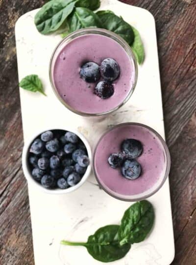 A superfood smoothie that is packed with nutriiton. Blueberries, banana, and spinach blend together in a delicious and high fiber smoothie perfect for breakfast. Made with yogurt and honey, this is a must try recipe. via createkidsclub.com