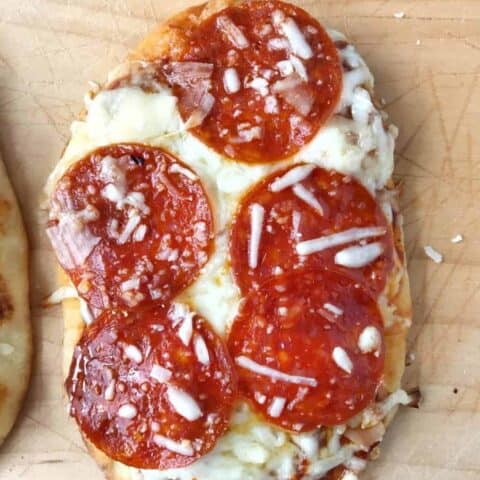 Naan Pizza Party (or flatbread) is the perfect sleepover party food. Kids can make these individual sized pizzas with the toppings they like. Bakes up in just 5 minutes. Perfect served cold in a lunch box.