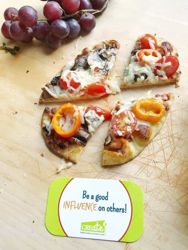 Naan Pizza Party (or flatbread) is the perfect sleepover party food. Kids can make these individual sized pizzas with the toppings they like. Bakes up in just 5 minutes. Perfect served cold in a lunch box.