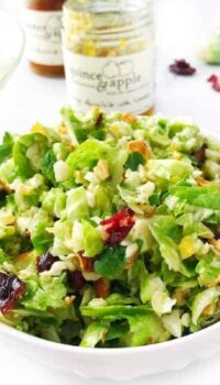 A bowl of salad with Brussels sprouts