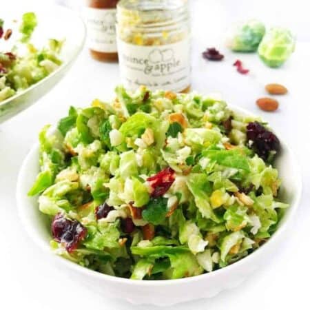 A bowl of salad with Brussels sprouts