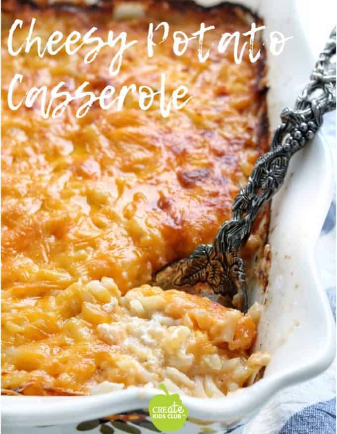 Healthy Cheesy Potato casserole is made with hashbrowns and greek yogurt. This easy holiday recipe can be made in the oven or slow cooker. #cheesypotatoes #cheesypotatocasserole #hasbrowns
