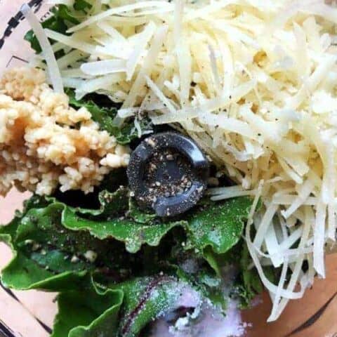 Beet Green Pesto ingredients in a blender.