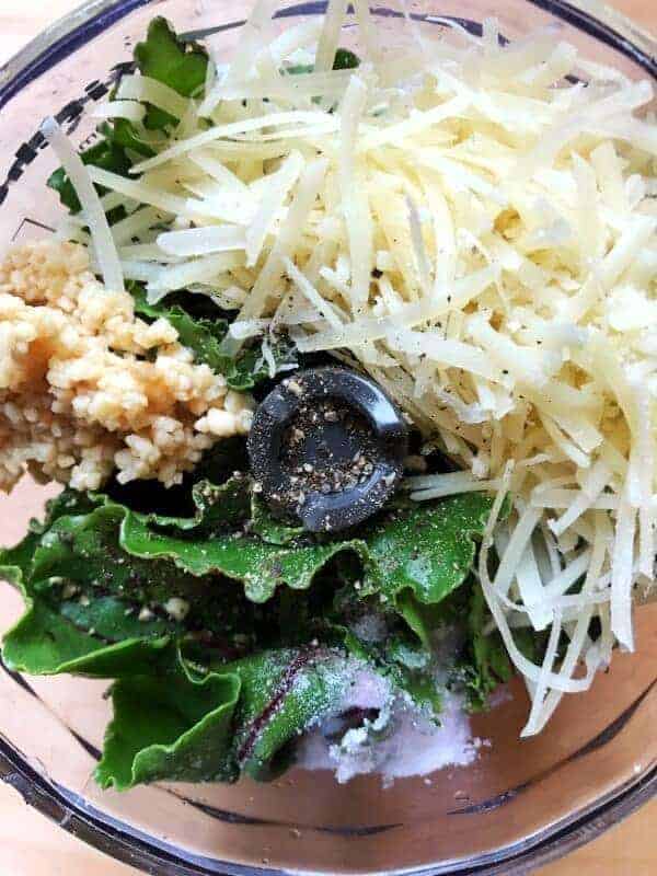 Beet Green Pesto ingredients in a blender.