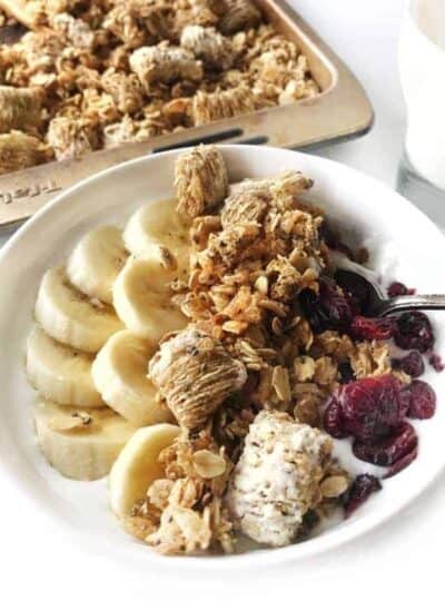 a bowl with bananas and granola