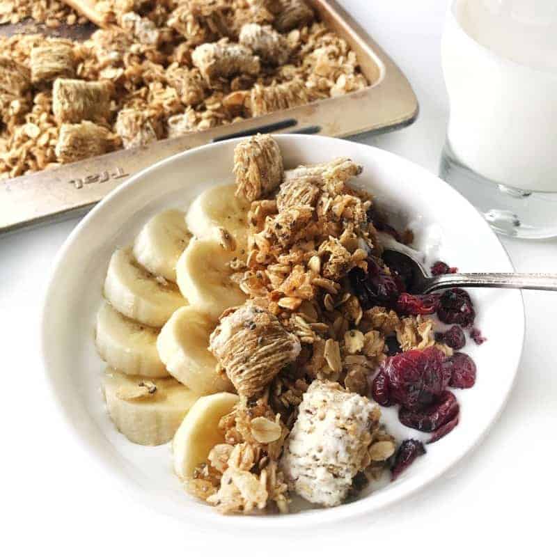 a bowl with bananas and granola