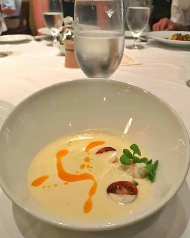 A bowl of soup on a table