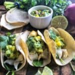 Baked Cod Fish Taco Recipe with holy moly guacamole, or a creamy guacamole perfect for fish tacos. This 20 minute family friendly dinner packs high flavor and vital nutrients your family needs.