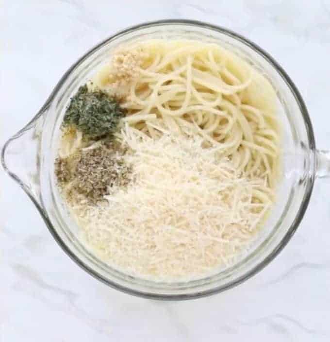 pasta and spices in a clear bowl
