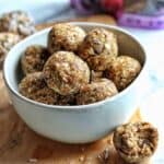 prune and peanut butter energy balls in a white bowl