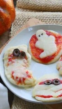 a plate with halloween pizzas