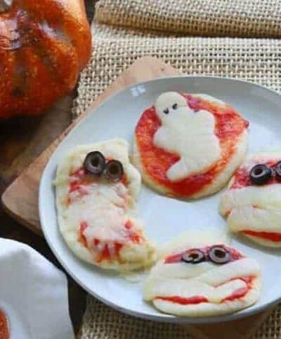 a plate with halloween pizzas