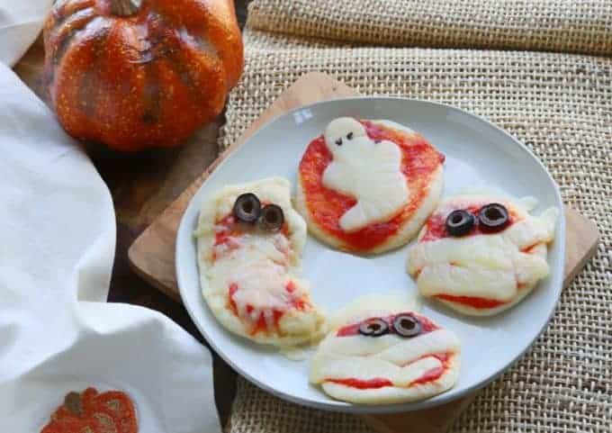 a plate with halloween pizzas