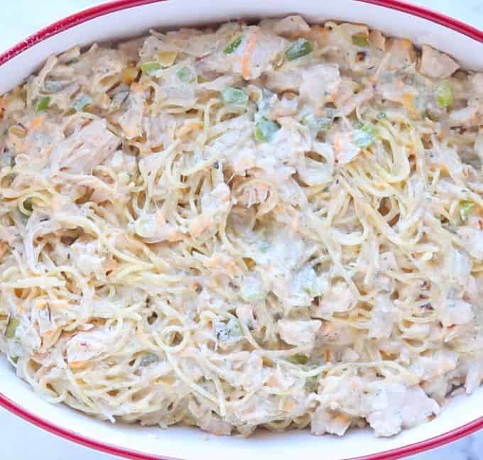 best chicken spaghetti recipe shown prior to baking in a baking pan.