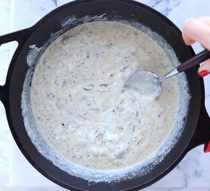 cream sauce in a cast iron skillet