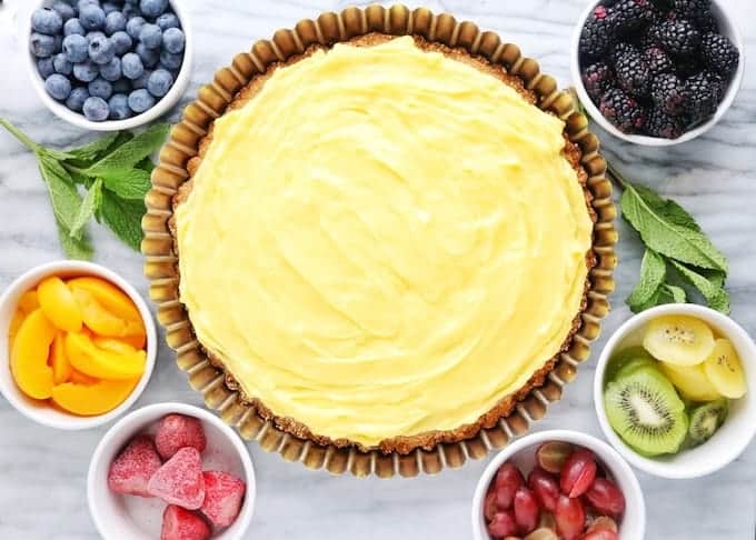 a fruit flan with the custard on top of the crust