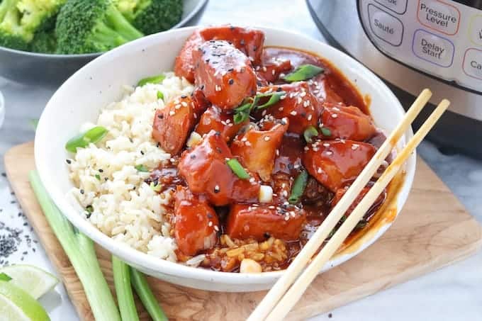 rice in a bowl with chinese chicken