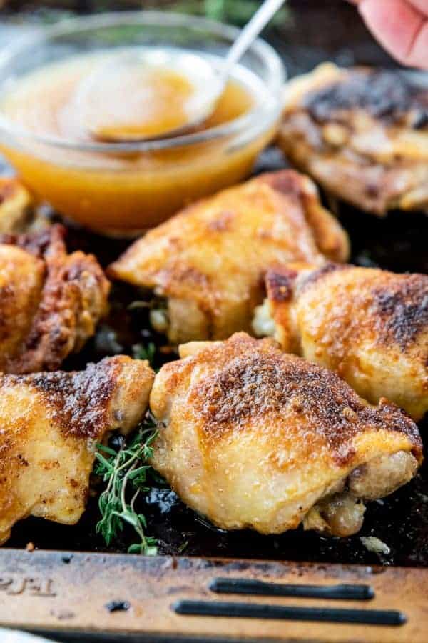baked chicken thighs on a tray