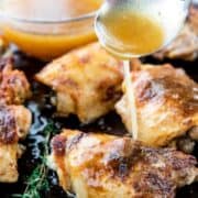 gravy drizzled onto chicken thighs