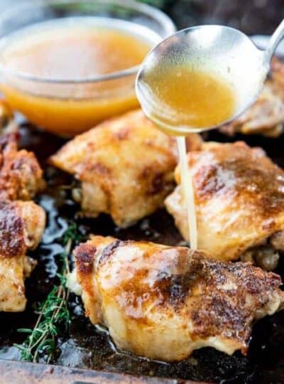 gravy drizzled onto chicken thighs