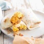 A plate of breakfast burritos