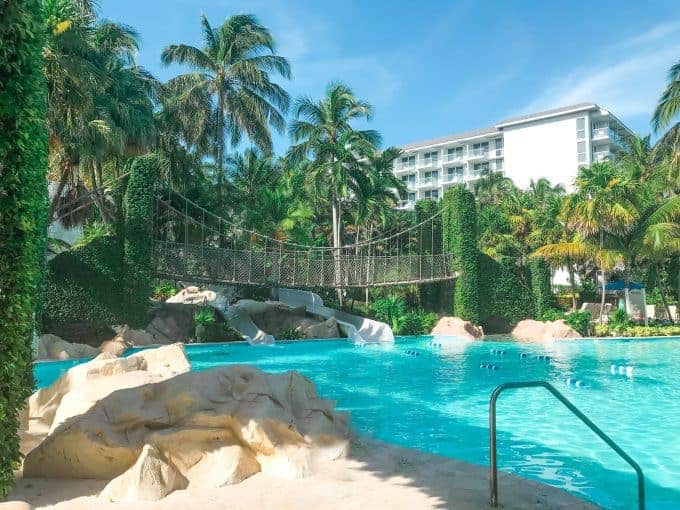 Hilton Sugar Mills Falls Water Park photo of pool with bridge and hotel in the background