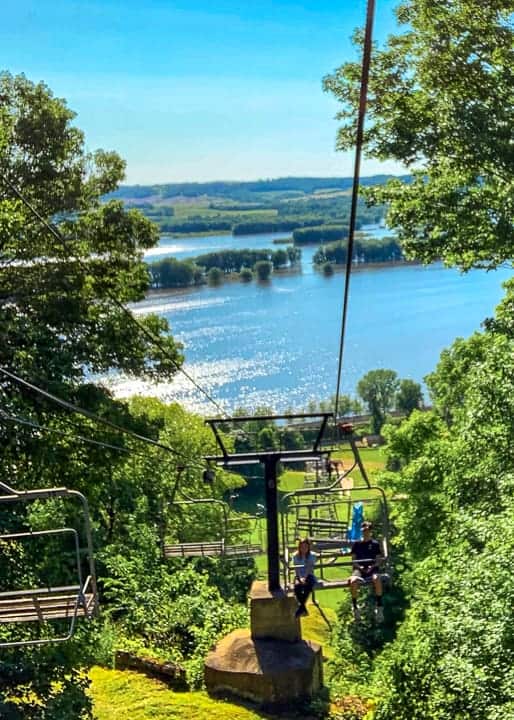 things to do in galena il showcasing the view from the ski lift at chestnut mountain in the summer