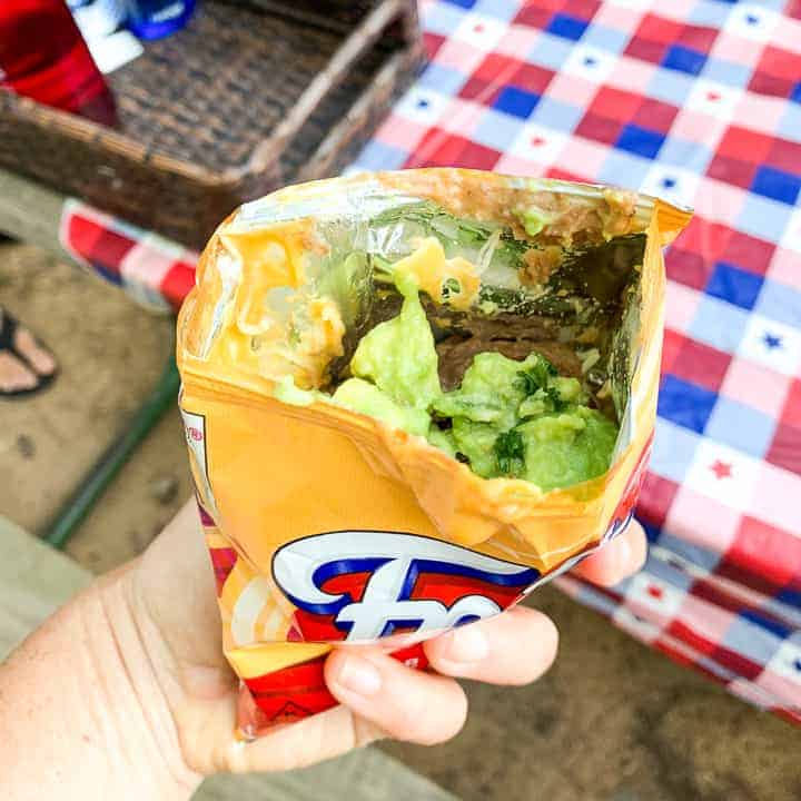 walking taco shown in front of picnic table