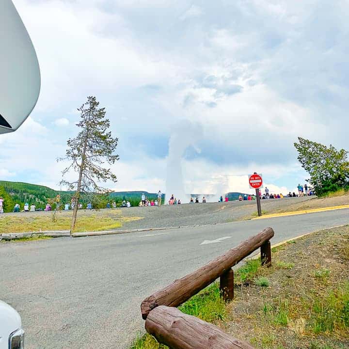 A view of Old Faithful from the inside of an RV rental from Hilltop Camper and RV.