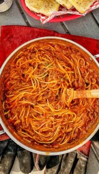 one pot of spaghetti on a campground table