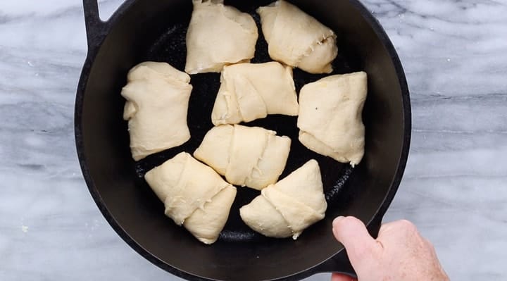 crescent rolls stuffed in a skillet