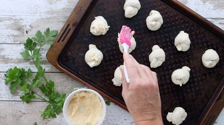 raw bread dough spread with butter