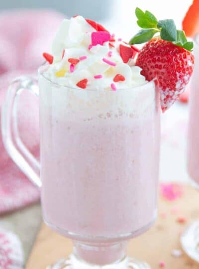 A close up of a cup of strawberry hot chocolate