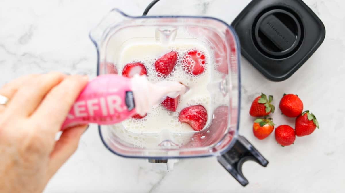 kefir being added to the blender.