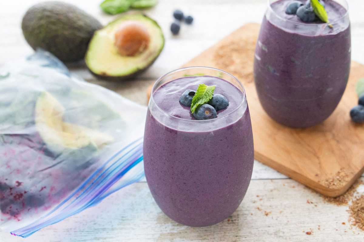 5 Veggie Packed Kid-Friendly Recipes showing Berry Avocado Smoothies on a countertop.