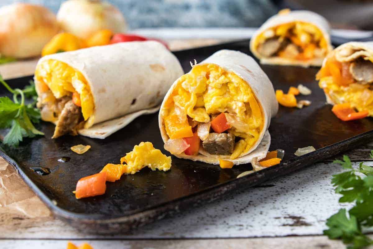 5 Veggie Packed Kid-Friendly Recipes showing Breakfast Burritos on a serving platter.