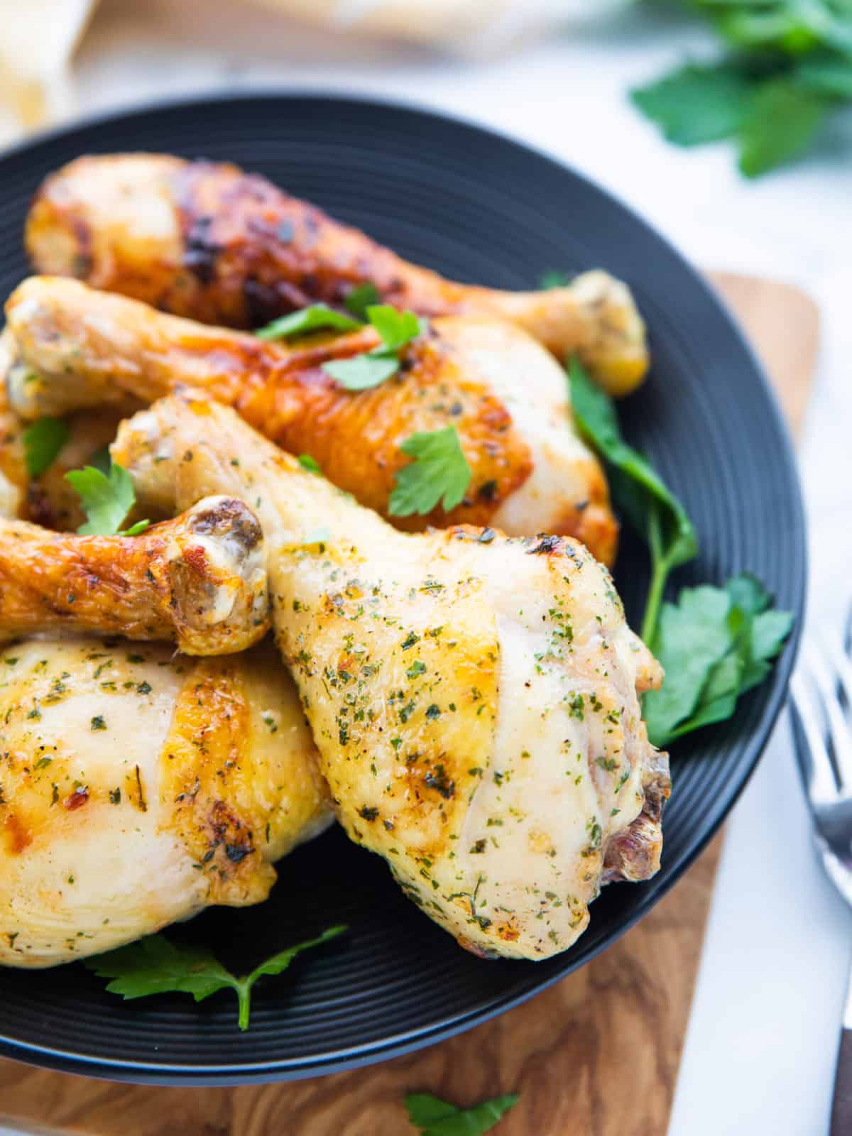 Air Fryer Drumsticks showing chicken legs on a serving platter.