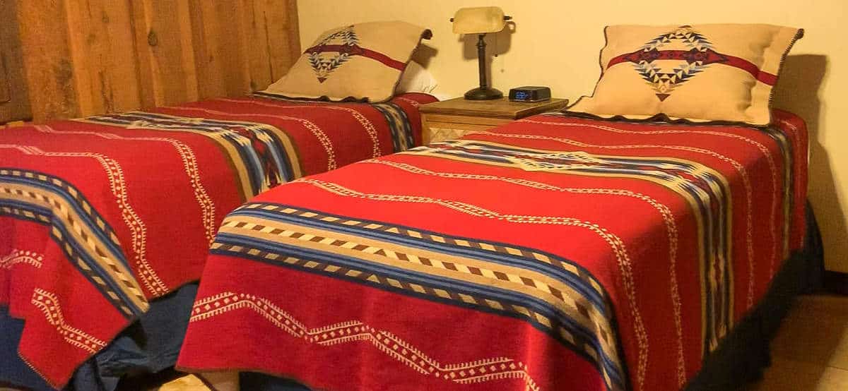 White Stallion Ranch, the Best All-Inclusive Resort in Arizona showing inside of the guest room, which included two twin beds.