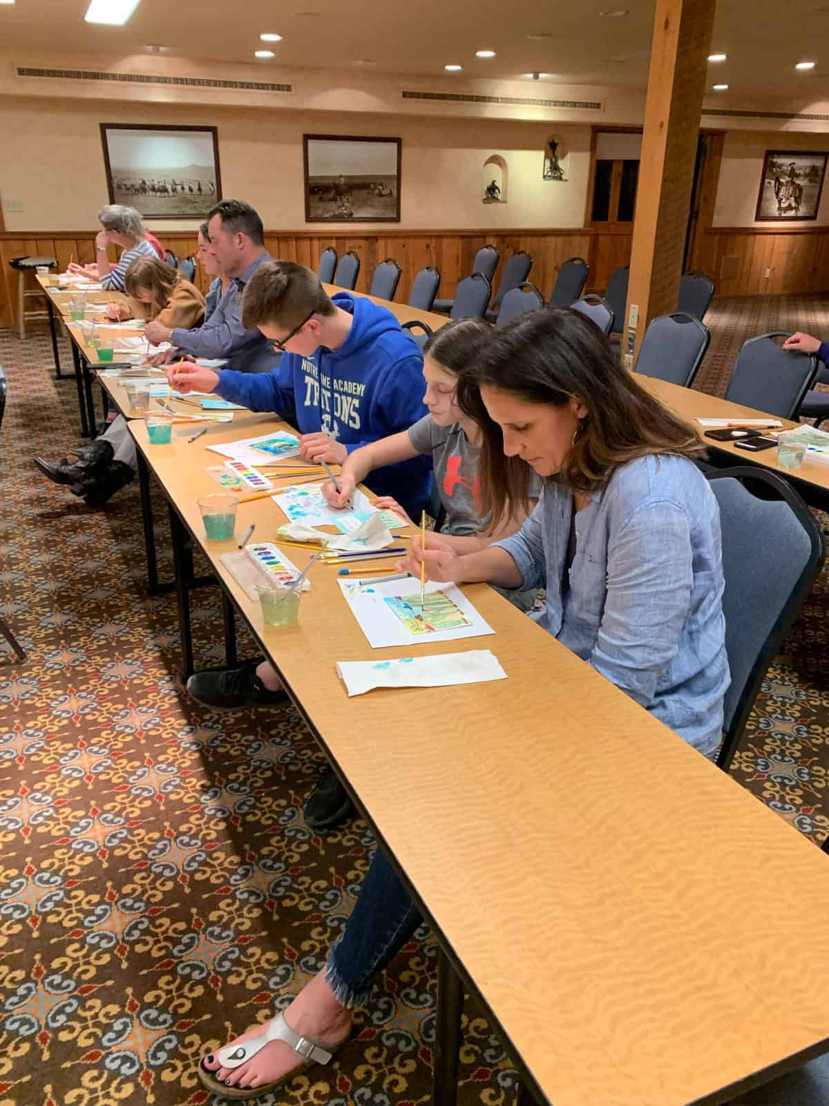 White Stallion Ranch, the Best All-Inclusive Resort in Arizona showing ranch members enjoying a watercolor lesson at the dude ranch.