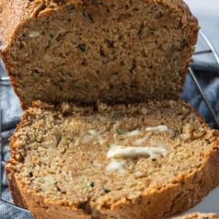 banana zucchini bread sliced with butter