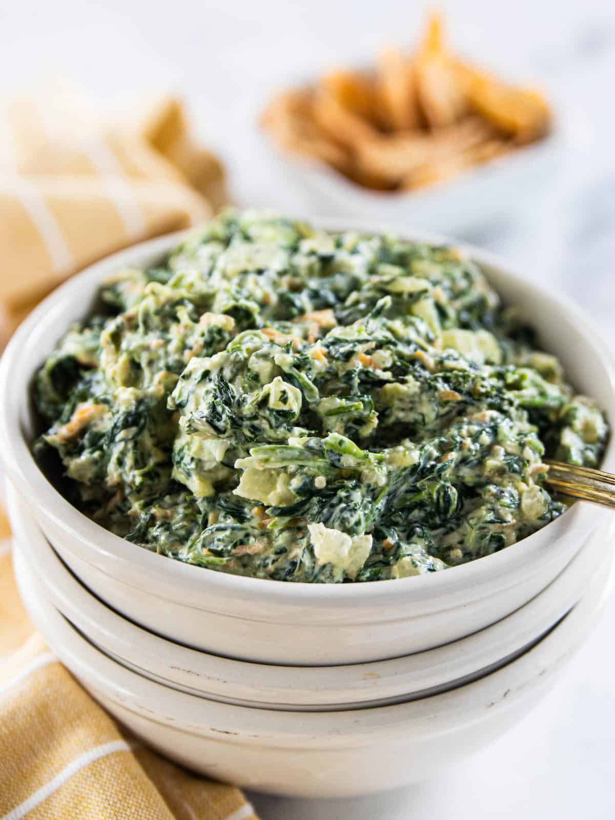 Greek Yogurt Spinach Dip in a white serving bowl.