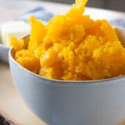 a bowl of butternut squash on a table