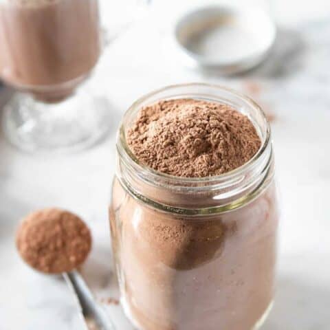 mason jar filled to the top with hot cocoa mix