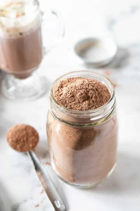 mason jar filled to the top with hot cocoa mix 