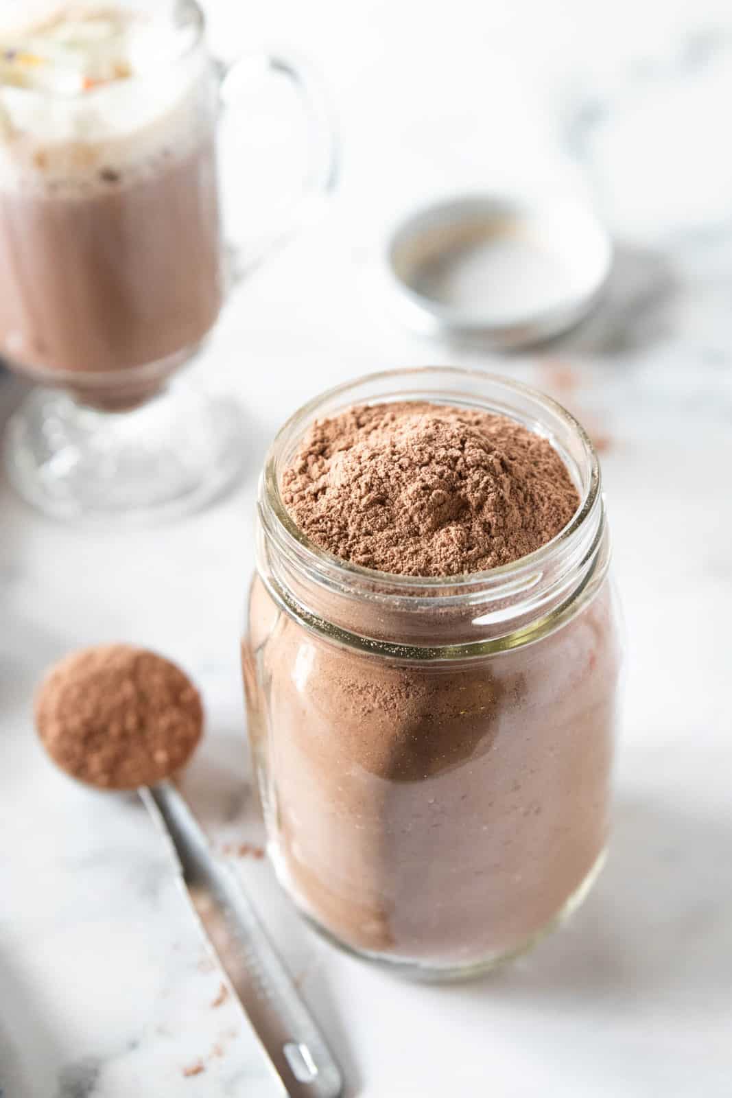 mason jar filled to the top with hot cocoa mix