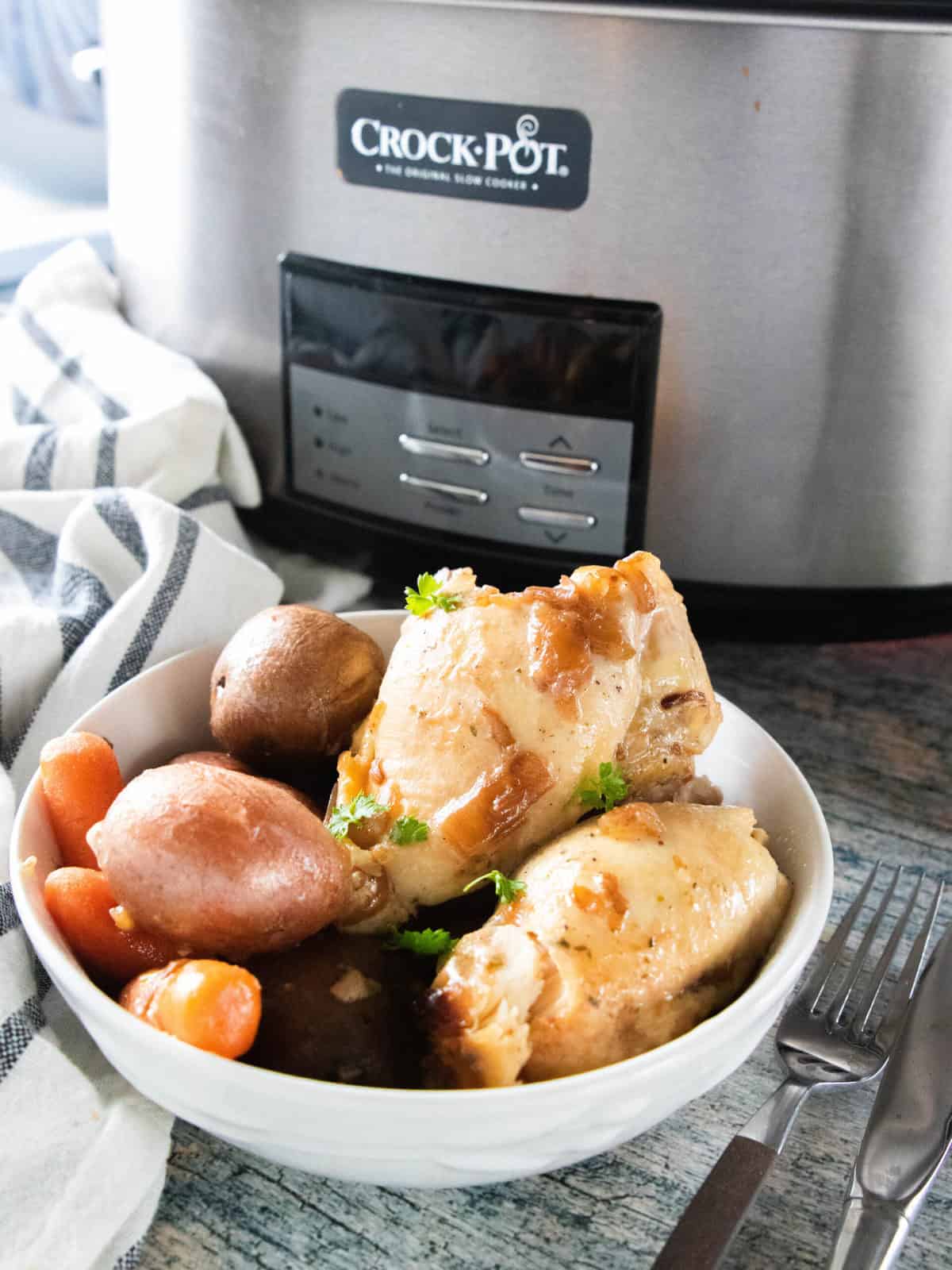 chicken thighs and vegetables in a bowl