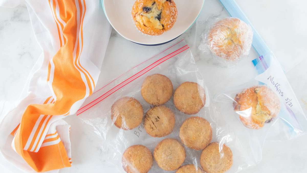 Muffins wrapped in Saran Wrap and placed in ziplock bag.