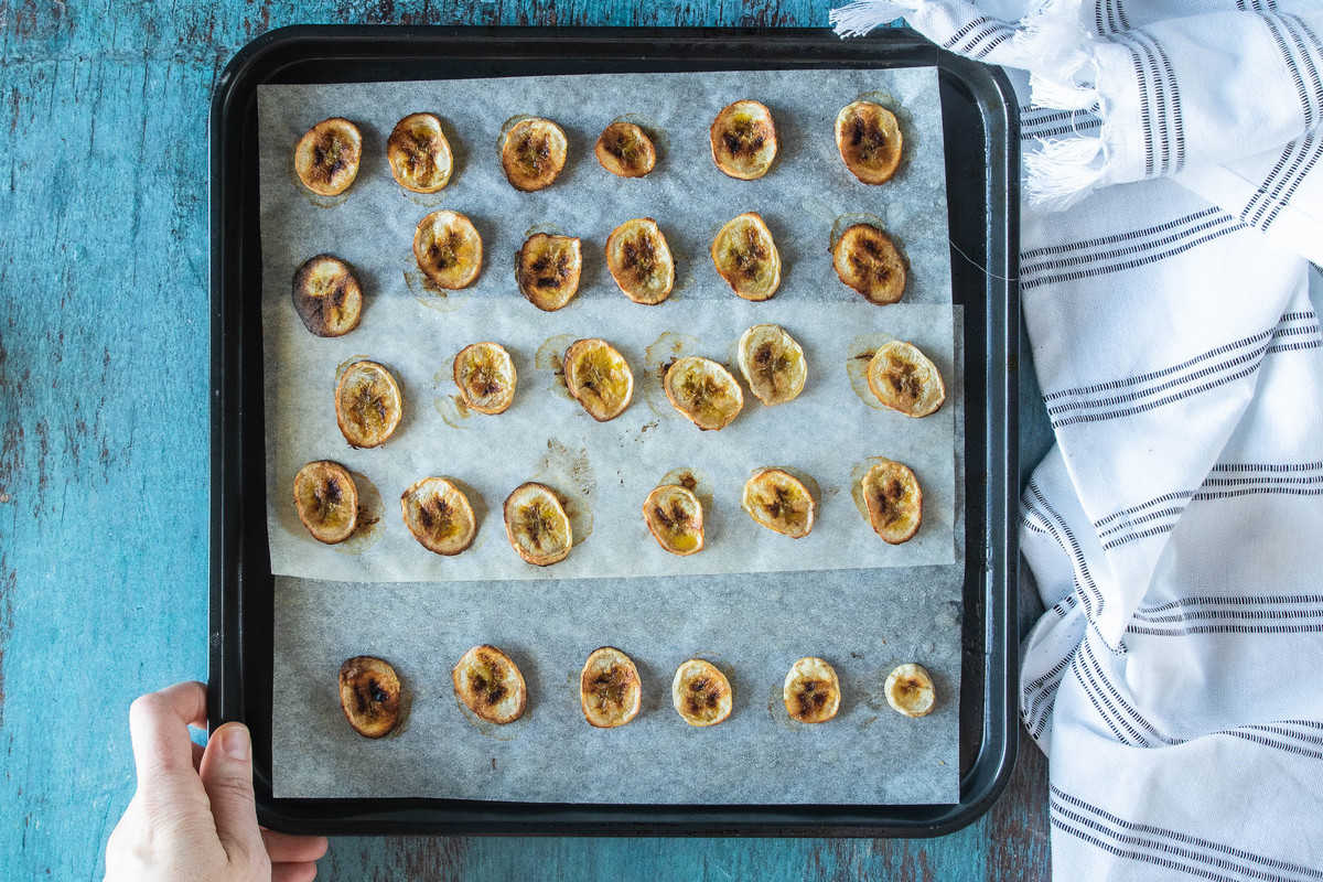 air fried banana chips on tray.