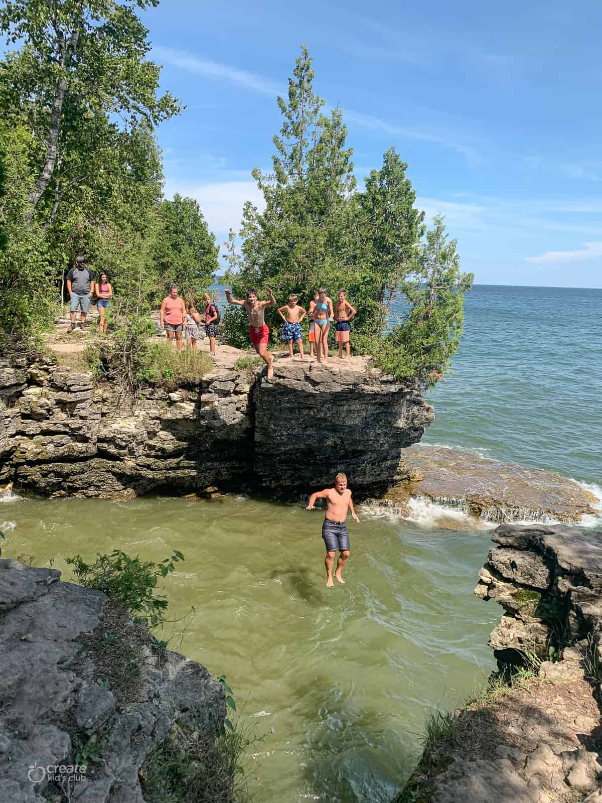 man jumping into water